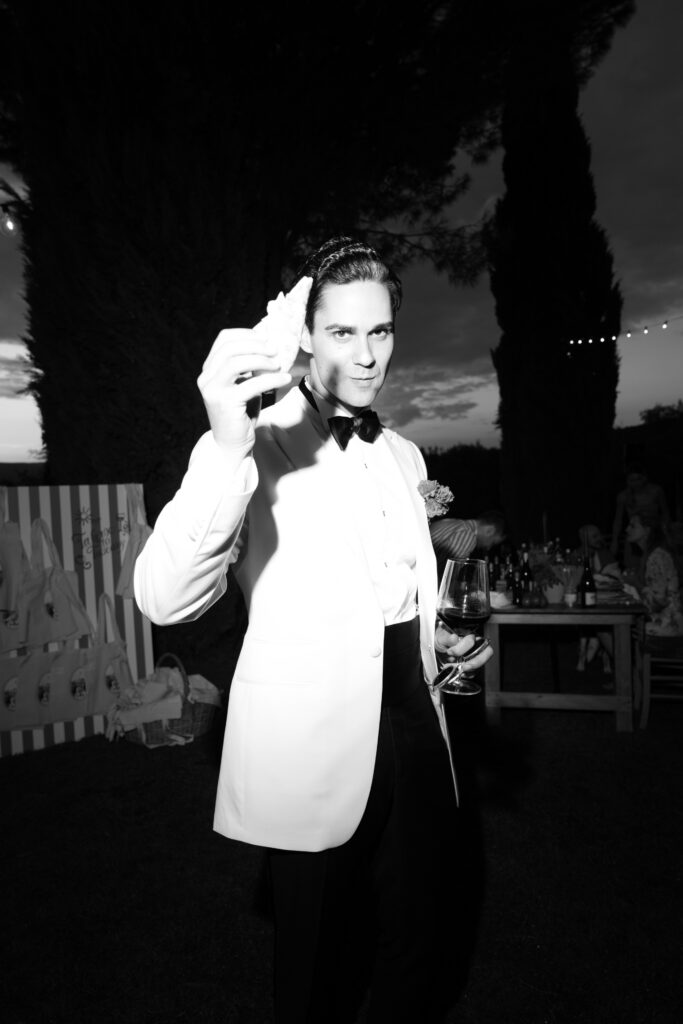 groom in tuscany pizza party